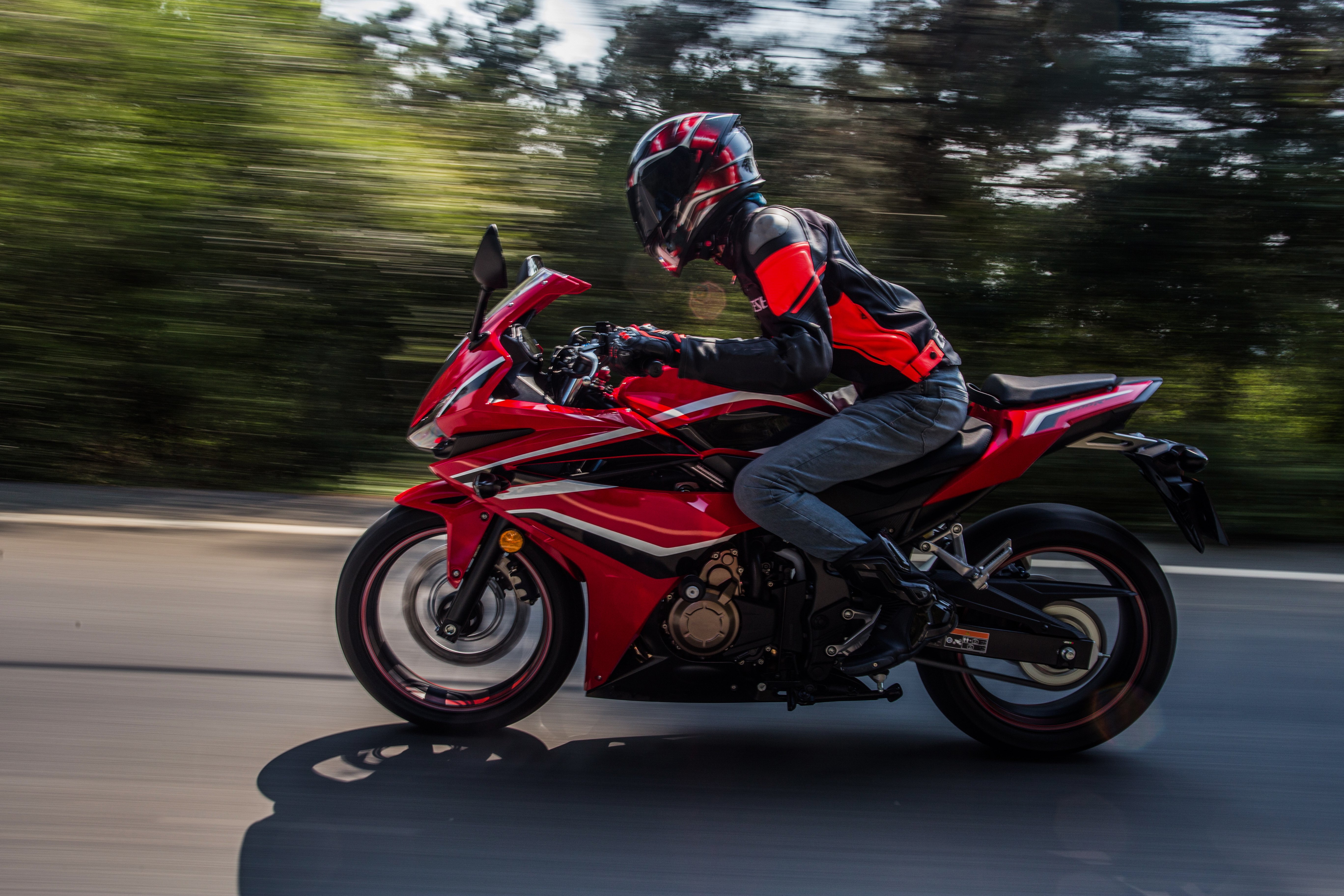 motorcyclist-biking-road