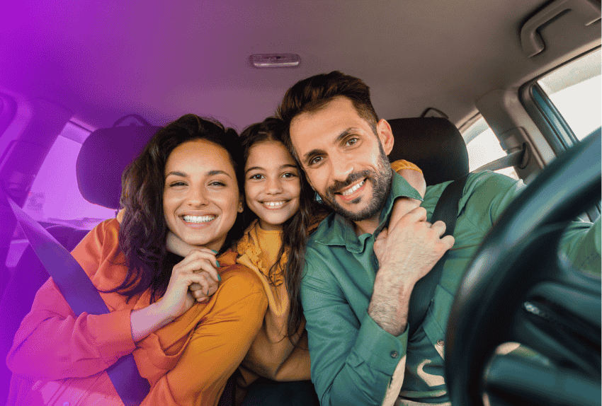 happy family sitting in car after refinance car loan  (1)