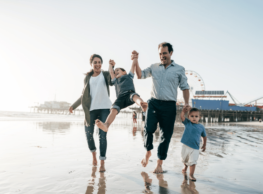 family holiday personal loan walking on the beach (1)