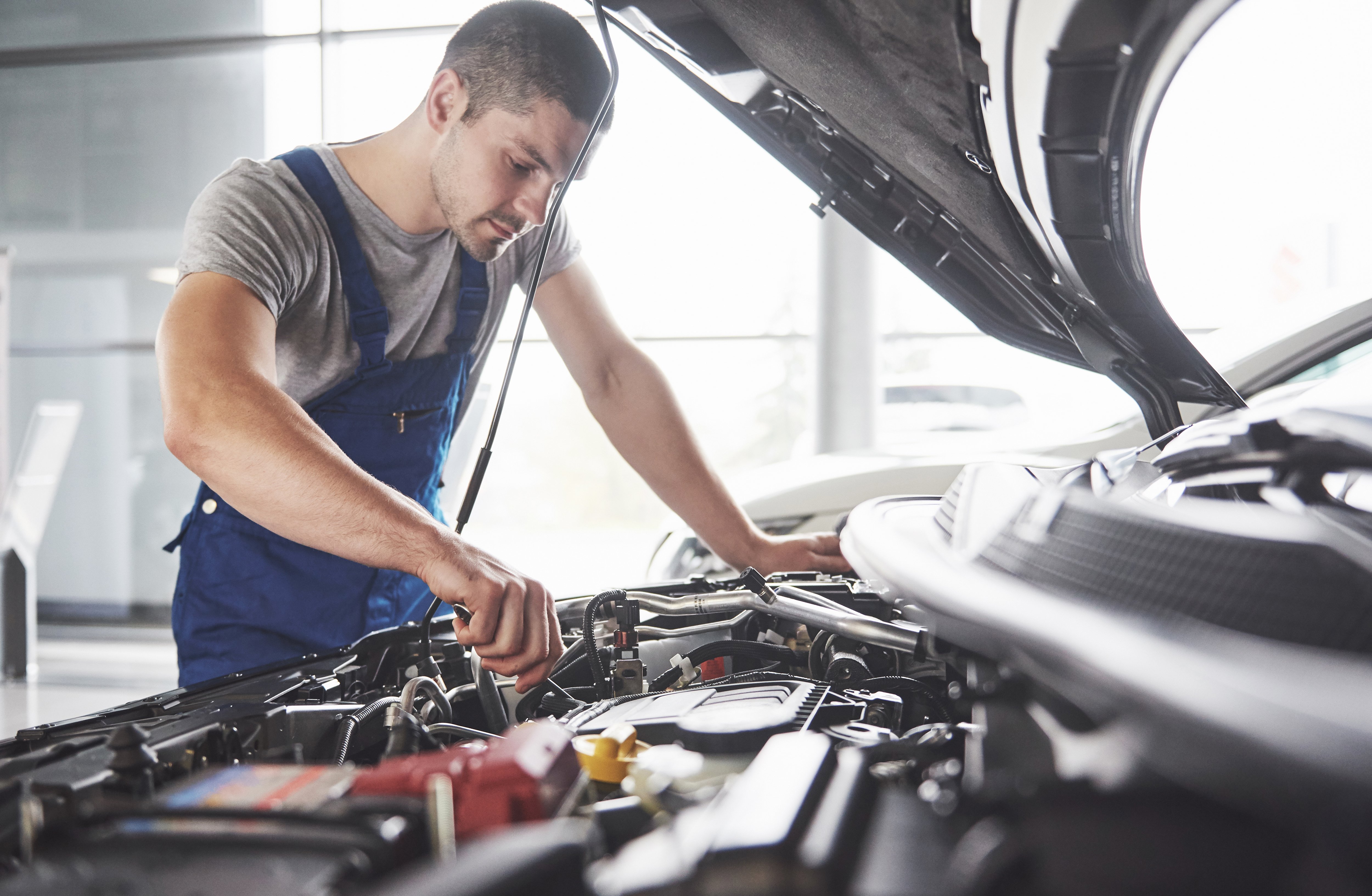 auto-mechanic-working-garage-repair-service