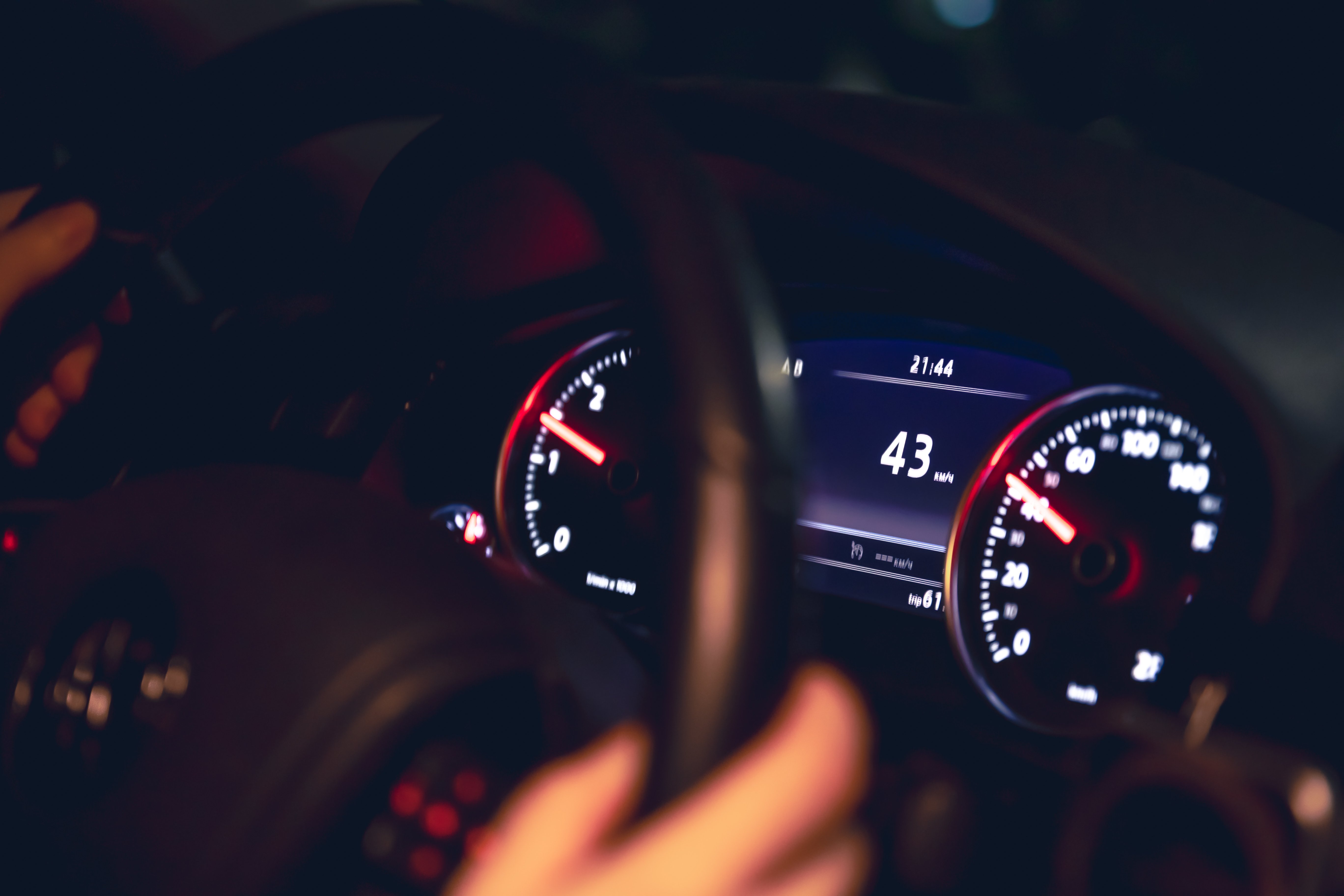 drivers-hands-steering-wheel-car-night-night-driving