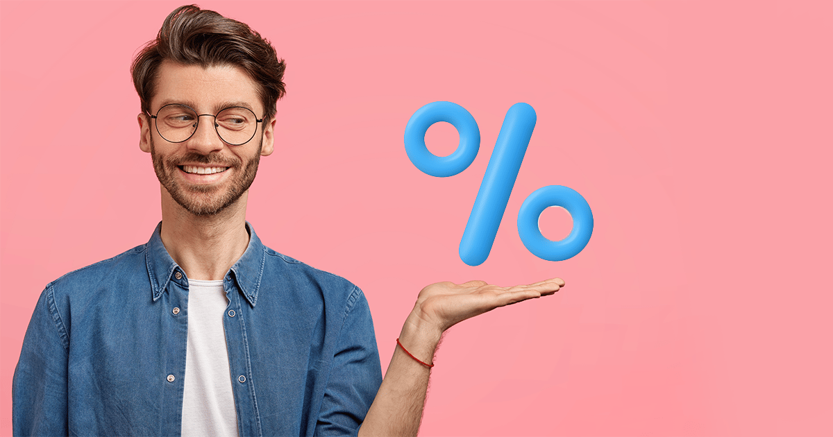 man holding percentage symbol